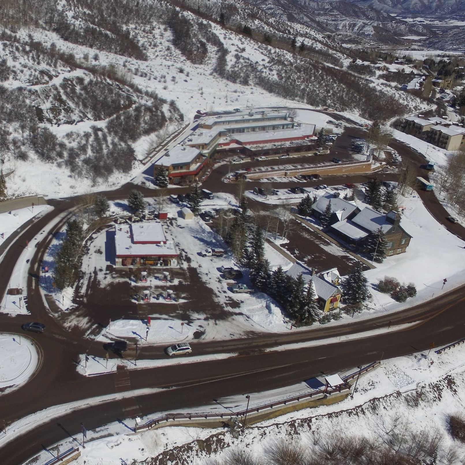 aerial photo overlooking the snowmass center and roundabout in winter time